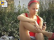 2 movies - Voyeur upskirt pussy of unshamed blonde girl making a phone call in the park