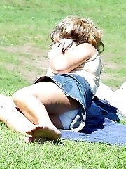 12 pictures - Candid upskirt photos, of blonde in mini