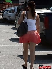12 pictures - Wind blowing up skirt. It looks really sexy
