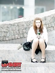 12 pictures - Sultry sitting upskirt photos