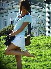 12 pictures - Hidden cam upskirt. Beatiful brunette in white caught