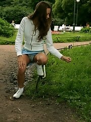 15 pictures - Watch cute chick in jeans skirt with white panties peeping