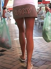 12 pictures - Cutie has very slim legs. Hot up skirt