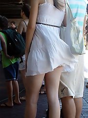 12 pictures - Pics wind blowing up skirts. Slim blondie caught