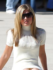 12 pictures - Upskirt, voyeured during photosession of sexy blonde