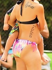 12 pictures - Model looking girls in tiny bikinis