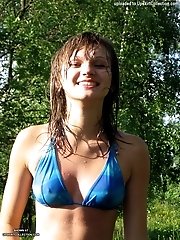 27 pictures - Their cloths are wet and sheer exposing nips