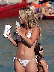 12 pictures - A bikini babe going topless on the Biarritz
