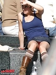 12 pictures - Female upskirt oops. Pink panties up her mini skirt